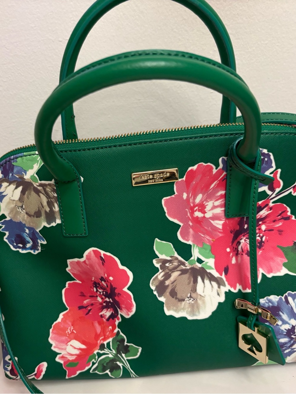 kate spade green floral dome satchel with red and purple blooms